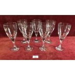 A set of seven large wine goblets