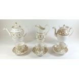 A group of 19th century gilt and white coffee cups and coffee pots, some damage