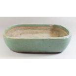 A Chinese green shallow pottery planter 26 x 18cm