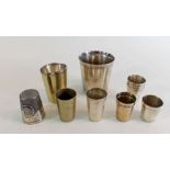 A Christofle beaker, various Victorian and other measures - one inscribed 'Just a Thimbleful', a