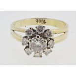 An 18 carat gold diamond cluster ring, the central stone approx. 35pts, size O