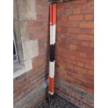 A set of seven vintage surveyors ranging poles - 180 cm tall