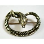 A mid 19th century 15 ct gold and black enamel serpent form brooch set chip diamond eyes 3.2cm x 2.