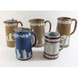 A selection of five 19th Century Jasperware jugs including one Wedgwood and one Copeland Spode -