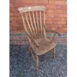 A light wood elm seat farmhouse slat back chair