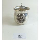 A Thailand sterling silver small mug with embossed decoration, 55g, 6cm tall