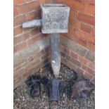An early 19th century large lead section of guttering pipe dated 1808 and three later cast iron down