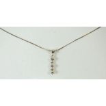 A silver necklace set with triple diamond drop - boxed