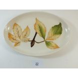 A Moorcroft oval dish painted horse chestnut leaves - 24 x 15cm