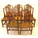 An 18th century matched set of eight Welsh country dining chairs with pierced vase splats and