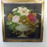 A framed needlework picture of a vase of flowers - 52 x 52cm