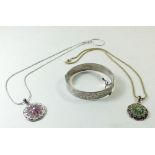 A silver hinged bangle and two silver filigree and enamel pendants and chain