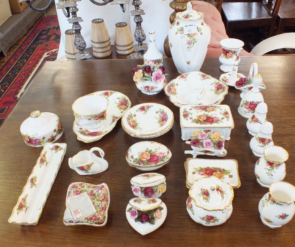 A quantity of Royal Albert Country Roses decorative items including vase, cruets, leaf dish, trinket