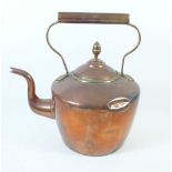 A 19th century copper kettle 29cm tall
