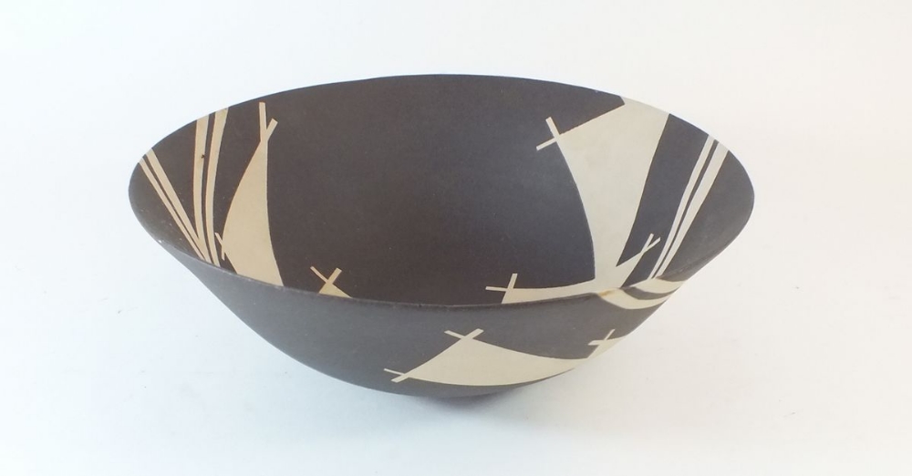 A black and white studio pottery bowl - 25 cm diameter