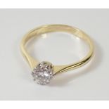 An 18 carat yellow gold diamond solitaire ring (approx 0.45 carats) size P - with associated