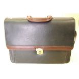 A green leather briefcase/satchel