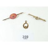 A 9ct gold bar brooch set with oval stone, a yellow metal bar brooch and a yellow metal Mizpah