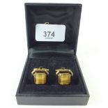 A pair of Burberry cufflinks