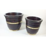 A graduated pair of brass bound wooden planters - max height 22cm tall