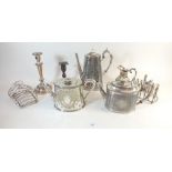 A Victorian silver plated tea set with engraved decoration, various toast racks etc