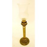 A brass candle lamp - 56.5cm tall
