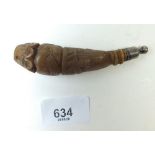 An early 18th century horn cutlery handle carved in the form of a robed priest 10cm