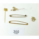 A 9ct gold stick pin and three others