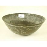 A Chinese brass bowl with engraved decoration, six character mark to base, 20cm diameter