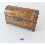 A leather and gilt tooled dome topped box 12.5 x 7cm tall, marked 'KNSM' (Royal Dutch steam boat