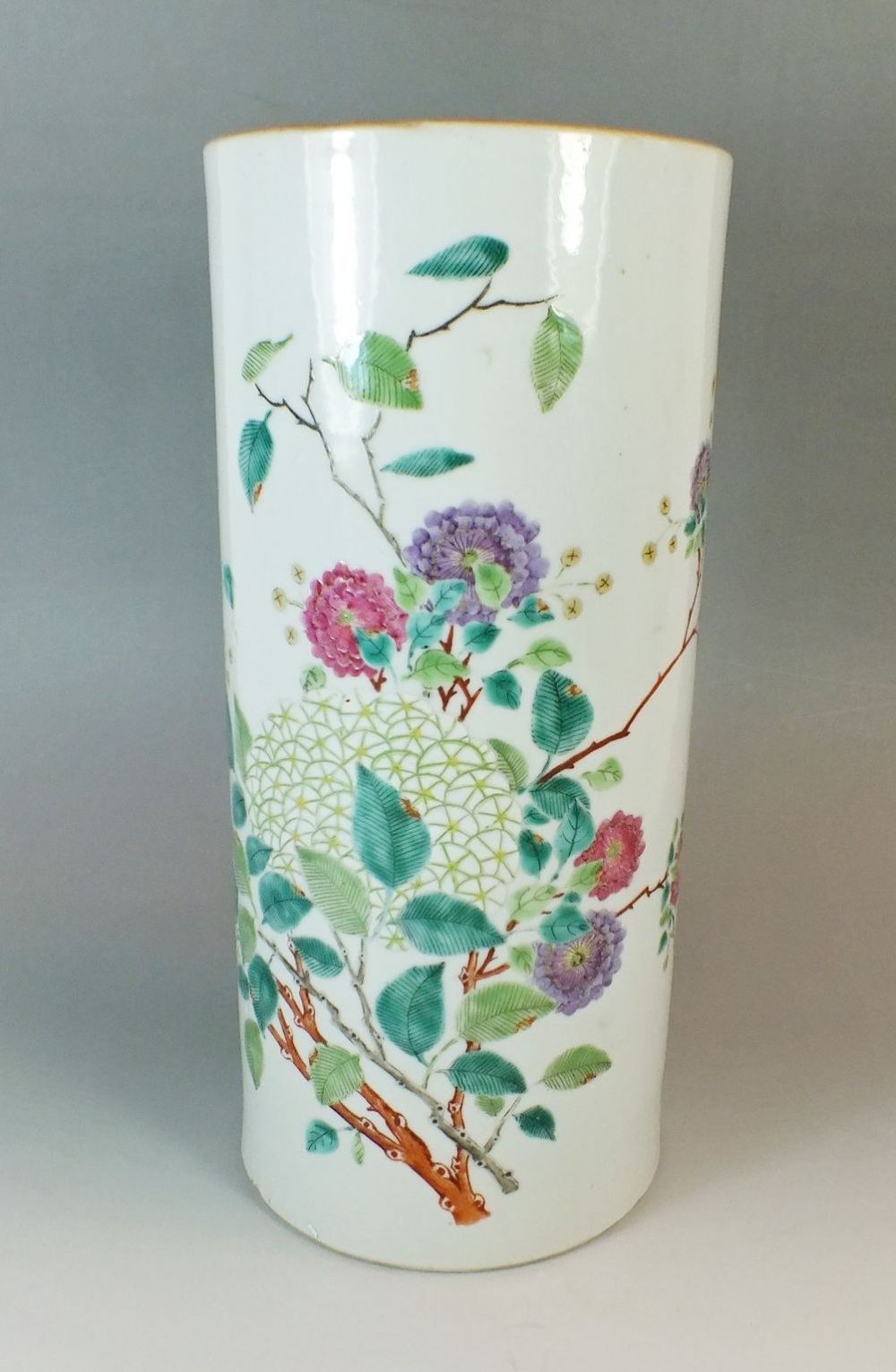 A 19th century Chinese famille rose cylindrical vase painted flowers and birds,