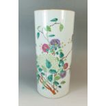 A 19th century Chinese famille rose cylindrical vase painted flowers and birds,