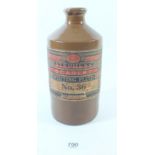 A stoneware Stephens's scarlet ink bottle No 36