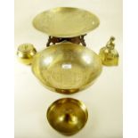 An oriental brass dish on wooden stand and other brassware