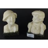 A pair of carved alabaster busts of boys, 14cm tall