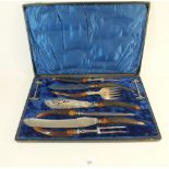A 19th century full carvery set with horn handles and silver collars in original case - Sheffield