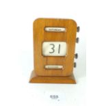 A 1930's perpetual desk calendar, 13.5cm tall