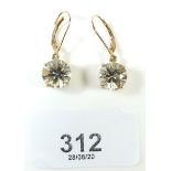 A pair of 9 carat gold earrings, possibly aquamarine