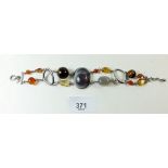 A silver and agate link bracelet