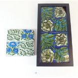 A William de Morgan tile decorated with corn flowers and leaves and two others painted roses both
