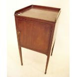 A small 19th century mahogany pot cupboard with low gallery top over a single cupboard 33cm wide