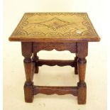 A small oak joint stool with incised decoration