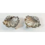 A pair of silver salts of shell form, Chester 1910, by James Deakin & Sons