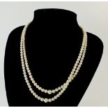 A double row pearl necklace with silver marcasite clasp