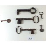 Six antique keys of various sizes.