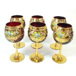 A set of six Italian red and gilt wine glasses