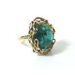 An unusual modernist 18 ct gold ring set green tourmaline (unmarked but tested gold) size O/P