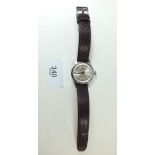 A Nivada Compensamatic 17 jewels wristwatch with brown leather strap and original box - recently