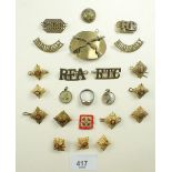 A selection of shoulder titles, buttons, etc