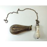 A Victorian ceramic toilet pull handle together with a brass powder flask